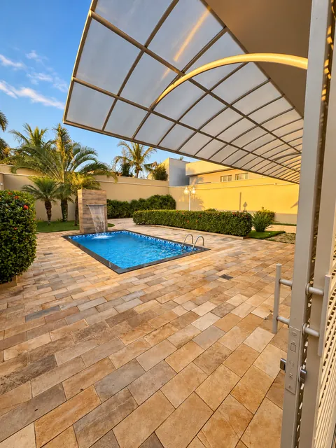 Piscina vista da área coberta, casa à venda no Condomínio Magnólias I em Araraquara